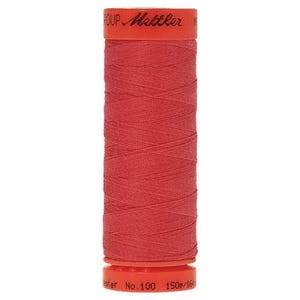 May include: A spool of red thread with the text "Mettler" and "No. 100 150m/164yd" printed on the label.
