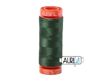 May include: A spool of dark green Aurifil 100% cotton thread. The spool has orange caps with the Aurifil logo and text. The thread is tightly wound around the spool, showcasing its texture and colour. Ideal for sewing and quilting projects.