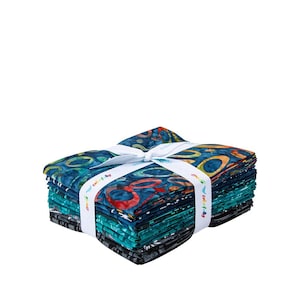 May include: A stack of colorful fabric squares tied with a white ribbon. The fabric features a vibrant pattern of blue, teal, and orange circles. The ribbon is printed with the words "colorfully". This fabric bundle is ideal for quilting and crafting projects.