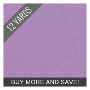 May include: A solid lavender fabric with a textured appearance. The image includes text that reads "12 YARDS" in a diagonal banner and "BUY MORE AND SAVE!" in a horizontal banner.