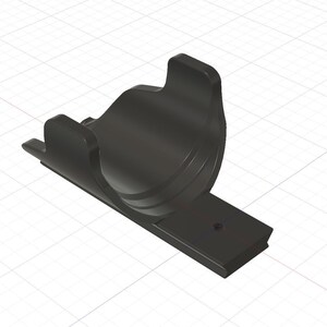 May include: A matte black, U-shaped mounting bracket featuring a curved cradle for cylindrical objects and a flat, rectangular base plate with a single centred screw hole for secure attachment to a flat surface.