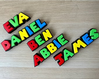 Signo de nombre personalizado con estilo Super Brothers - Decoración de pared colgante - Placa de nombre - Pantalla de escritorio - Regalo para fanáticos de los juegos - Regalo personalizado para niños