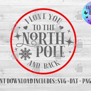 May include: Red circle with the text "I love you to the North Pole and back" in gray. There are two hearts, two stars, and a snowflake in the circle.