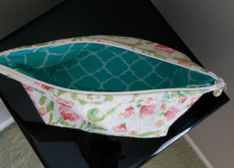 Lined zippered pouch.