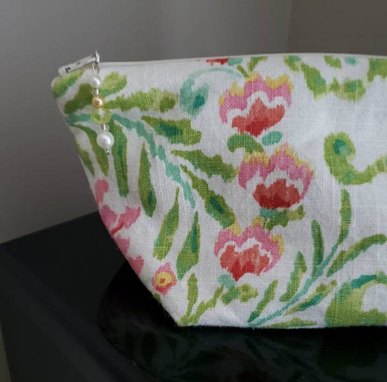 Lined zippered pouch.
