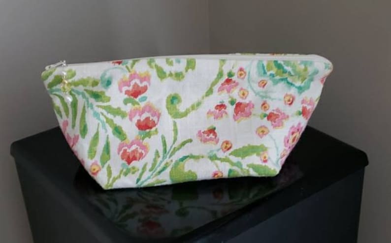 Lined zippered pouch.