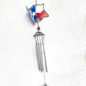 Campanello a vento con bandiera del Texas e carta colorata argento del Texas