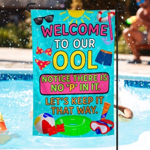May include: A blue and pink welcome sign with the text "Welcome to our OOL Notice there is no 'P' in it. Let's keep it that way." The sign features a variety of pool-themed graphics, including sunglasses, a swimsuit, a pool float, and a diving mask.