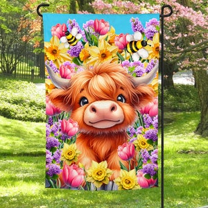 May include: A cute cartoon Highland cow with brown fur and a white face is surrounded by colorful flowers, including pink tulips, yellow daffodils, and purple flowers. There are also bees flying around the flowers.