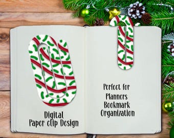 Op de afbeelding: Digitaal paperclip-ontwerp met een rood en groen pepermuntpatroon. Perfect voor planners, bladwijzers en organisatie.