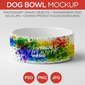 Op de afbeelding: Witte hondenvoerbak met een kleurrijk verfspatterontwerp in blauw, groen, geel en rood. De tekst "Your Art Work Here" staat op de kom. De woorden "DOG BOWL MOCKUP" staan bovenaan.