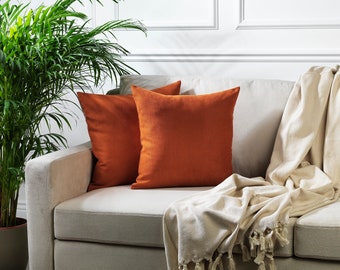 orange throws and pillows