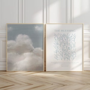 May include: Two framed prints, one with a blue sky and white clouds, the other with a line drawing of plants and the text "THE BLESSING" and a quote from the Bible: "The Lord bless you and keep you; the Lord make his face shine on you and be gracious to you; the Lord turn his face toward you and give you peace." Numbers 6:24-26