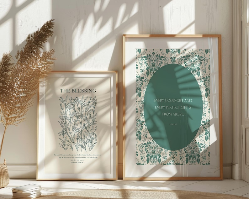 May include: Two framed prints with a white background and green floral designs. The print on the left features a botanical illustration of a plant with the text "The Blessing" and a Bible verse. The print on the right features a green circle with the text "Every good gift and every perfect gift is from above" and a Bible verse.