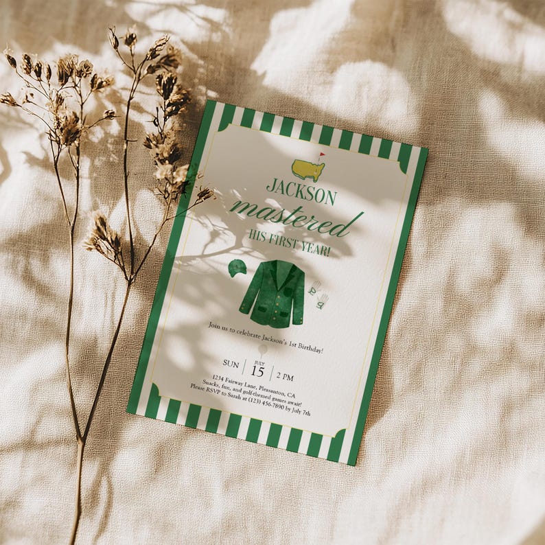 May include: A golf-themed invitation with a green and white striped border. The invitation features the text "JACKSON mastered HIS FIRST YEAR!" and includes illustrations of a golf jacket and cap. The date and time are also included.