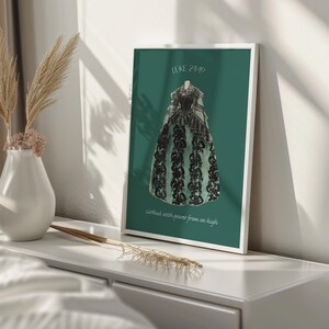 May include: A framed print with a green background featuring a black and green dress with the text "Luke 2:19" and "clothed with power from on high".