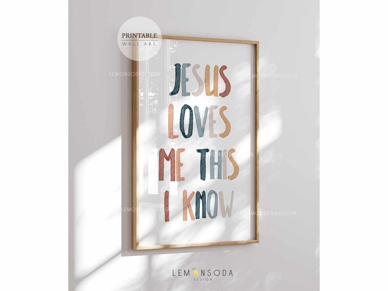 May include: A printable wall art print with the text "Jesus Loves Me This I Know" in colorful, stylized lettering. The background is white with a subtle texture.