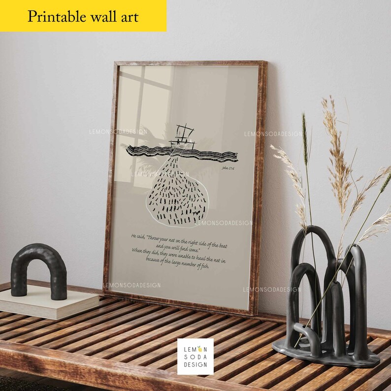 May include: A printable wall art print with a beige background and a black and white illustration of a boat with a net full of fish. The text "He said, 'Throw your net on the right side of the boat and you will find some.' When they did, they were unable to haul the net in because of the large number of fish." is printed below the illustration.