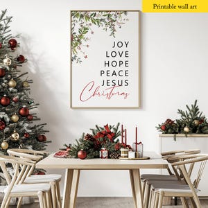May include: Printable wall art with a Christmas message. The art features a floral design with red berries and the words "Joy, Love, Hope, Peace, Jesus, Christmas".