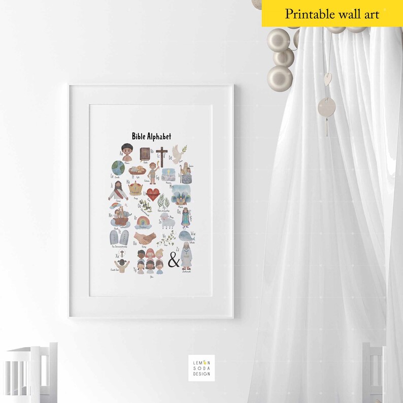 May include: A framed print featuring the "Bible Alphabet" in a colorful, illustrated style. The artwork includes various biblical symbols and characters, perfect for a child's room or nursery. The print is in a white frame.