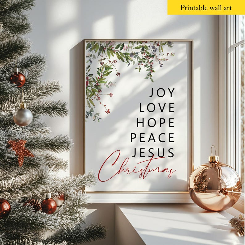 May include: Printable wall art with a white background and a floral design in the top left corner. The words "JOY LOVE HOPE PEACE JESUS Christmas" are written in black and red lettering.