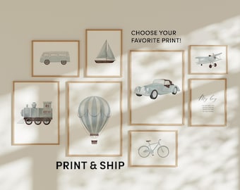 May include: A set of nine printable wall art prints featuring various transportation themes, including a sailboat, hot air balloon, aeroplane, train, car, bicycle, and van. The prints are all in a light blue and white colour scheme with a minimalist design.