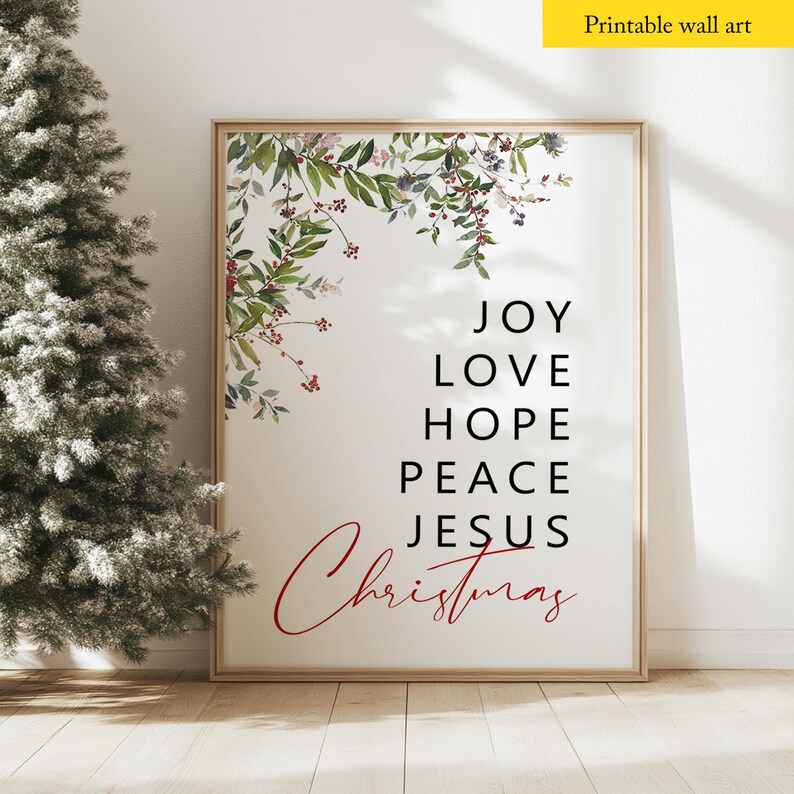May include: Printable wall art with a watercolor floral design in shades of green and red. The text reads "Joy Love Hope Peace Jesus Christmas".