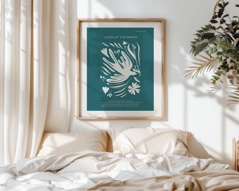 May include: A teal blue poster with a white stylized bird and floral design. The poster has the text "Look at the Birds" and a bible verse from Matthew 6:26.