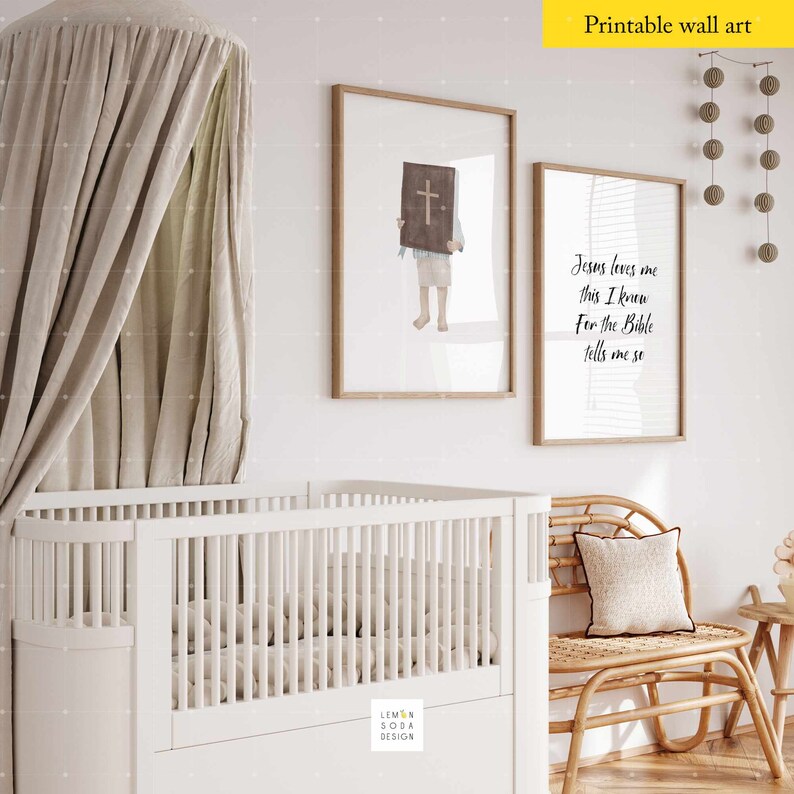 May include: Two printable wall art prints with a white background and black text. The first print features a watercolor illustration of a child holding a Bible. The second print features the text "Jesus loves me this I know For the Bible tells me so".