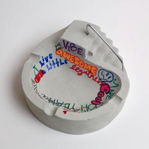 Concrete graffiti skate bowl ashtray