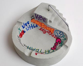 Concrete graffiti skate bowl ashtray