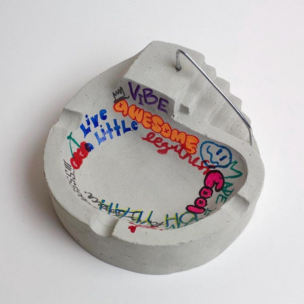 Concrete graffiti skate bowl ashtray