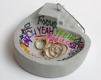 Concrete graffiti skate bowl decoration