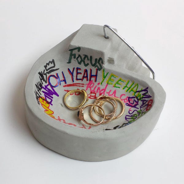 Concrete graffiti skate bowl decoration