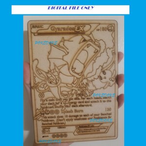 May include: A wooden Pokemon card featuring Gyarados EX, a water-type Pokemon. The card is brown and has a detailed illustration of Gyarados. The card text reads "Flip a coin until you get tails. For each heads, search your deck for a Gyarados card and attach it to this Pokemon. Shuffle your deck afterward. Splash Burn 130 This attack does 10 damage to each of your Benched Pokemon. (Don't apply weakness and resistance for Benched Pokemon)."