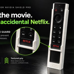 May include: A white 3D-printed remote case for the Nvidia Shield Pro, featuring a built-in Netflix guard to prevent accidental button presses and rear chevrons for a textured grip. The text reads: Stay in the movie. Skip the accidental Netflix.