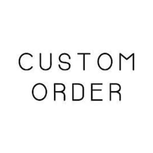 May include: The words "CUSTOM ORDER" are displayed in a minimalist, sans-serif font. The text is centered against a plain white background, creating a clean and straightforward design. The letters are black.
