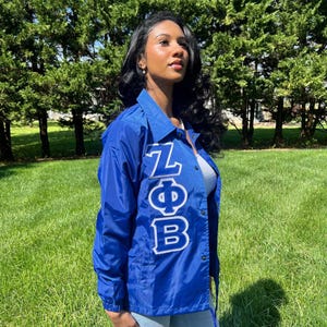 Zeta Phi Beta Greek Letter Ladies' Cut Greek Letter Jacket (Black/ Blue)
