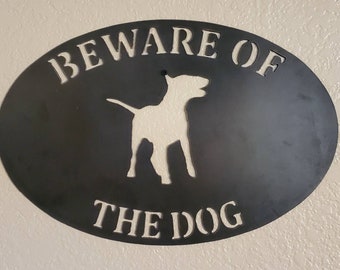 Beware of Dog sign with a Bull Terrier metal sign