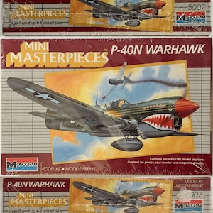 May include: A set of three ceramic mugs with a speckled, matte finish. The mugs are in shades of cream, light gray, and dark gray. Each mug has a simple, minimalist design, perfect for coffee or tea.