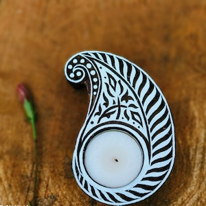paisley tea light holder candle holders or wooden printing block fabric , clay pottery, cookies and tattoo
