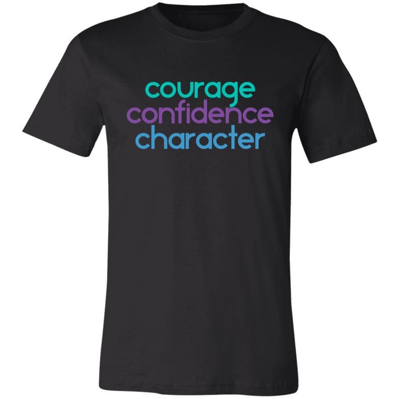May include: Black t-shirt with the words "courage", "confidence", and "character" printed in blue, purple, and teal.