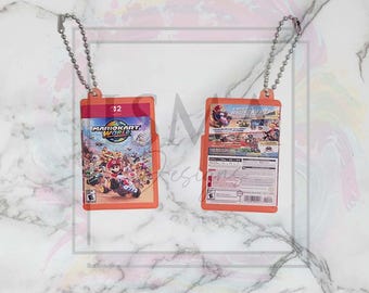 Estuche/llavero para minijuegos Switch 2 de color rojizo