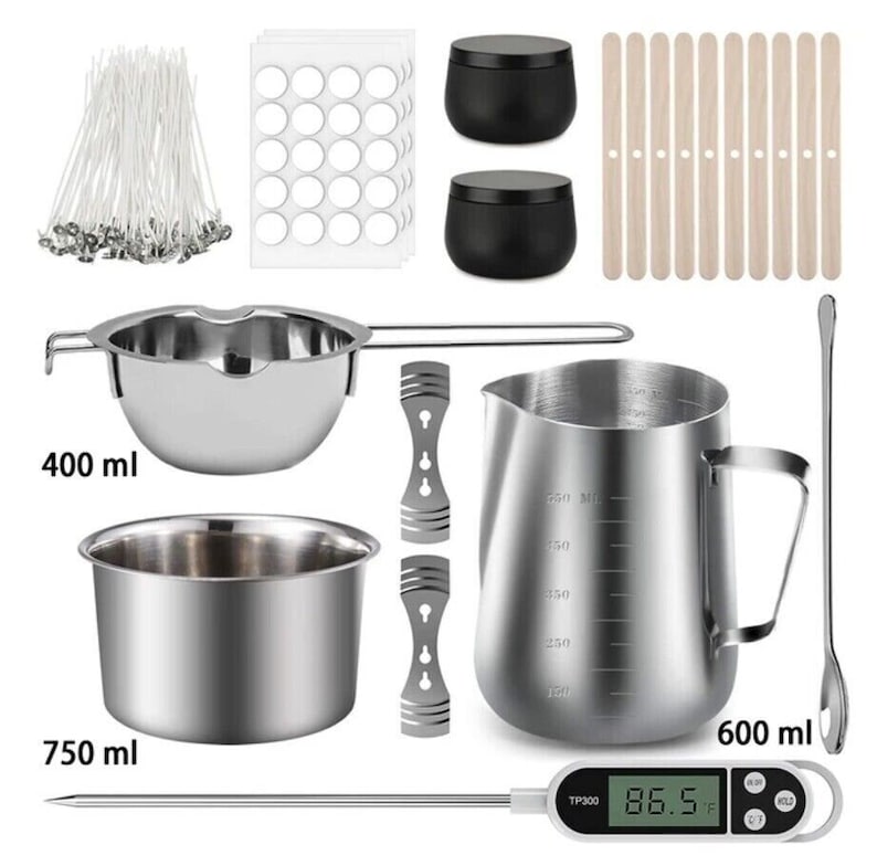 May include: Candle making kit with a digital thermometer, two stainless steel melting pots, a stainless steel pitcher, wooden stirring sticks, and a set of 12 candle wicks.