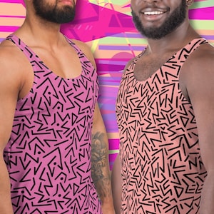 May include: Two men wearing pink tank tops with a black geometric pattern. The tank tops have a scoop neck and are sleeveless.