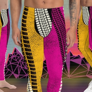 May include: Black, yellow, and pink leggings with a tire tread pattern. The leggings are worn by a person standing in front of a colorful background.