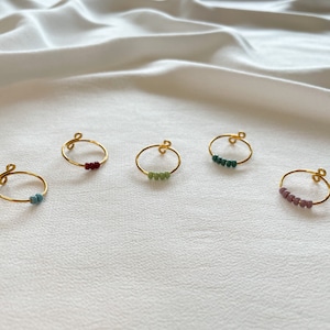 Simple golden anxiety rings with colorful glass beads image 8