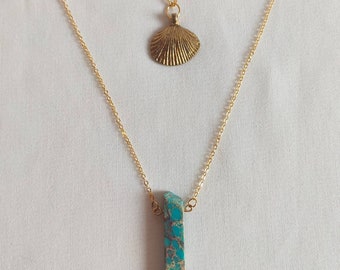 Gold chains with jasper and shell pendant