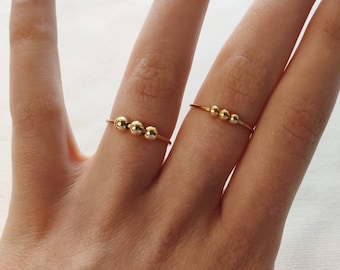 Einfache Goldene anxiety Ringe mit Gold Kugeln