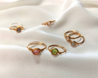 Simple wire wrapped rings with different gemstones